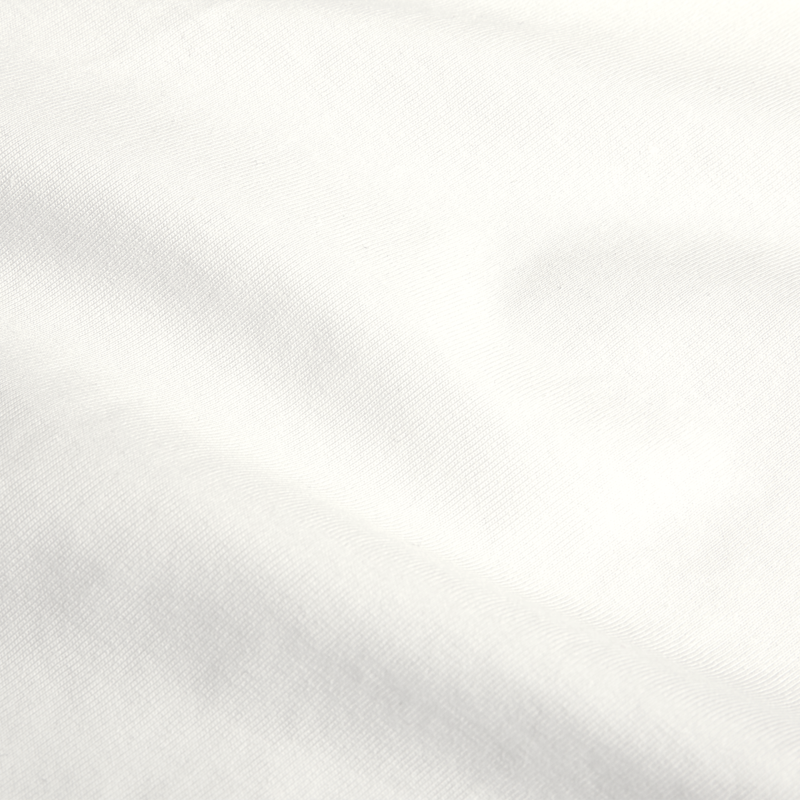 Le pull brodé blanc crème